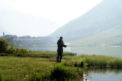 Angler auf dem See von Tignes